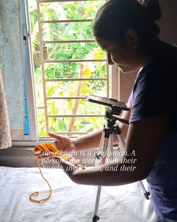 The maker filming her work by the window at the Roy's studio