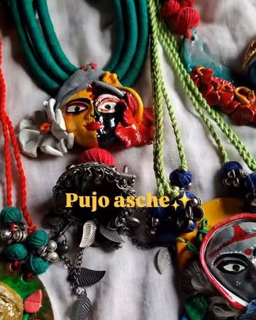 Pujo statement necklaces with painted faces